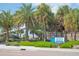 Entrance to Venice Beach featuring palm trees and a sign at 639 Cornwell On The Gulf, Venice, FL 34285
