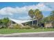 Modern beach pavilion with unique wing-like roof design at 639 Cornwell On The Gulf, Venice, FL 34285
