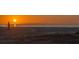 Tranquil sunset view over the ocean and sandy beach at 639 Cornwell On The Gulf, Venice, FL 34285
