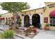 Charming cafe with outdoor seating and flowers at 639 Cornwell On The Gulf, Venice, FL 34285