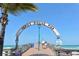 Entrance to Venice Fishing Pier with couple walking at 639 Cornwell On The Gulf, Venice, FL 34285