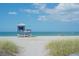 Blue lifeguard stand on sandy beach by ocean at 639 Cornwell On The Gulf, Venice, FL 34285