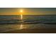 Golden sunset reflecting on the ocean waves at 639 Cornwell On The Gulf, Venice, FL 34285