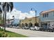 Quaint street with shops and palm trees at 639 Cornwell On The Gulf, Venice, FL 34285