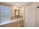 Bathroom boasts a vessel sink, updated vanity, and window at 640 Venice Ln, Sarasota, FL 34242
