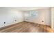 Simple bedroom with hardwood floors and neutral walls at 640 Venice Ln, Sarasota, FL 34242
