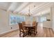 Bright dining room with hardwood floors and chandelier at 640 Venice Ln, Sarasota, FL 34242