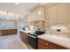 Renovated kitchen boasts new countertops and backsplash at 640 Venice Ln, Sarasota, FL 34242
