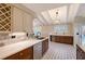 Bright kitchen with stainless steel appliances and ample counter space at 640 Venice Ln, Sarasota, FL 34242