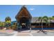 Beachside restaurant with a thatched roof at 640 Venice Ln, Sarasota, FL 34242