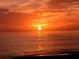 Stunning sunset over the ocean with vibrant colors at 640 Venice Ln, Sarasota, FL 34242