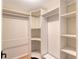 Spacious walk-in closet with ample shelving and hanging rods at 640 Venice Ln, Sarasota, FL 34242
