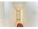 Clean hallway with tile floor and access to other rooms at 707 40Th W St, Palmetto, FL 34221