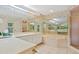 Elegant bathroom with double sinks, a large bathtub, and updated fixtures at 7323 Oak Moss Dr # 42, Sarasota, FL 34241