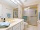 Bathroom with a shower, toilet, and vanity with a sink at 7323 Oak Moss Dr # 42, Sarasota, FL 34241