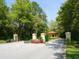 Ornate entrance gate leads into the Bent Tree community at 7323 Oak Moss Dr # 42, Sarasota, FL 34241