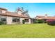 Well-maintained home with a tiled roof and a large backyard at 7323 Oak Moss Dr # 42, Sarasota, FL 34241