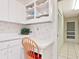 Kitchen with built-in desk and access to laundry at 7323 Oak Moss Dr # 42, Sarasota, FL 34241