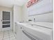 Convenient laundry room with washer, dryer, and extra storage space at 7323 Oak Moss Dr # 42, Sarasota, FL 34241