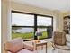 Bright living room showcasing a relaxing water view at 7323 Oak Moss Dr # 42, Sarasota, FL 34241