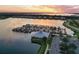 Aerial view of a marina with many boats and a community clubhouse at 931 Mangrove Edge Ct, Bradenton, FL 34208