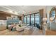 Luxury bedroom with water views and sitting area at 1206 Blue Shell Loop, Sarasota, FL 34240