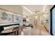 Main bedroom with sitting area and ensuite bathroom at 1206 Blue Shell Loop, Sarasota, FL 34240