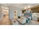 Main bedroom with sitting area and ensuite bath at 1206 Blue Shell Loop, Sarasota, FL 34240