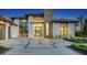 Luxury home features a stylish facade and landscaped entry at 1206 Blue Shell Loop, Sarasota, FL 34240