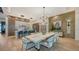 Modern kitchen with island and dining area at 1206 Blue Shell Loop, Sarasota, FL 34240