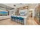 Modern kitchen with stainless steel appliances and an island at 1206 Blue Shell Loop, Sarasota, FL 34240