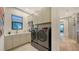 Laundry room with washer, dryer and sink at 1206 Blue Shell Loop, Sarasota, FL 34240