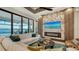 Living room boasts a fireplace and opens to patio at 1206 Blue Shell Loop, Sarasota, FL 34240