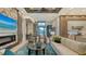 Open concept living area with kitchen and entryway at 1206 Blue Shell Loop, Sarasota, FL 34240