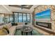 Modern living room with sectional sofa and water views at 1206 Blue Shell Loop, Sarasota, FL 34240