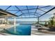 Stunning pool with a screened enclosure and lake views at 1206 Blue Shell Loop, Sarasota, FL 34240