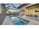 Stunning pool and spa with outdoor kitchen and bar at 1206 Blue Shell Loop, Sarasota, FL 34240