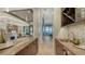 Elegant wet bar with wine storage and sink at 1206 Blue Shell Loop, Sarasota, FL 34240