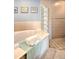 Bathroom features a soaking tub and glass block shower at 1323 Mediterranean Dr # 111, Punta Gorda, FL 33950