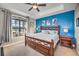 Main bedroom with king-size bed and water view at 1323 Mediterranean Dr # 111, Punta Gorda, FL 33950