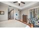 Bedroom with king-size bed and access to the workout area at 1323 Mediterranean Dr # 111, Punta Gorda, FL 33950