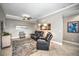 Living Room with comfortable seating and large windows at 1323 Mediterranean Dr # 111, Punta Gorda, FL 33950