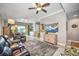 Spacious living room with large TV and comfortable seating at 1323 Mediterranean Dr # 111, Punta Gorda, FL 33950