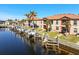 Two story building with attached garages and boat docks at 1323 Mediterranean Dr # 111, Punta Gorda, FL 33950