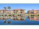 Waterfront property with boats docked and building reflections at 1323 Mediterranean Dr # 111, Punta Gorda, FL 33950