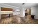 Open dining area with kitchen views and wood floors at 1348 Westport Ln # 1405, Sarasota, FL 34232