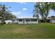 Ranch-style home with a large grassy yard at 1348 Westport Ln # 1405, Sarasota, FL 34232