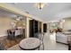 Sunroom features a seating area and access to the dining and living areas at 1348 Westport Ln # 1405, Sarasota, FL 34232