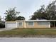 One-story house with a carport and mature landscaping at 1630 29Th St, Sarasota, FL 34234