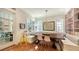 Built-in banquette and wood table create a cozy breakfast nook at 1714 Irving St, Sarasota, FL 34236
